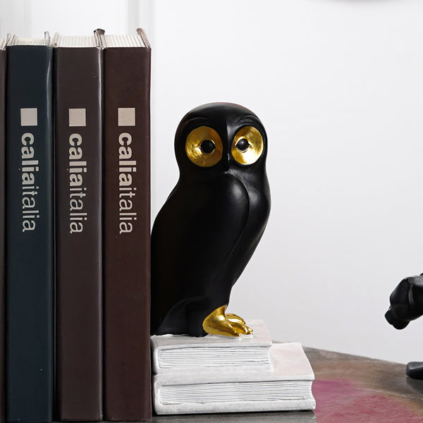 Buy Silent Sentinels Painted Resin Book End (Black) - Set Of Two Book End from Vaaree