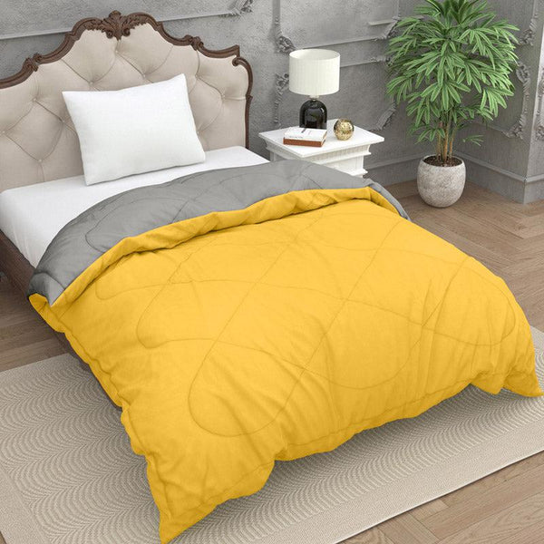 Buy Nihara Reversible Dual Color Glace Cotton Comforter (Yellow & Grey) - 200 GSM Comforters & AC Quilts from Vaaree