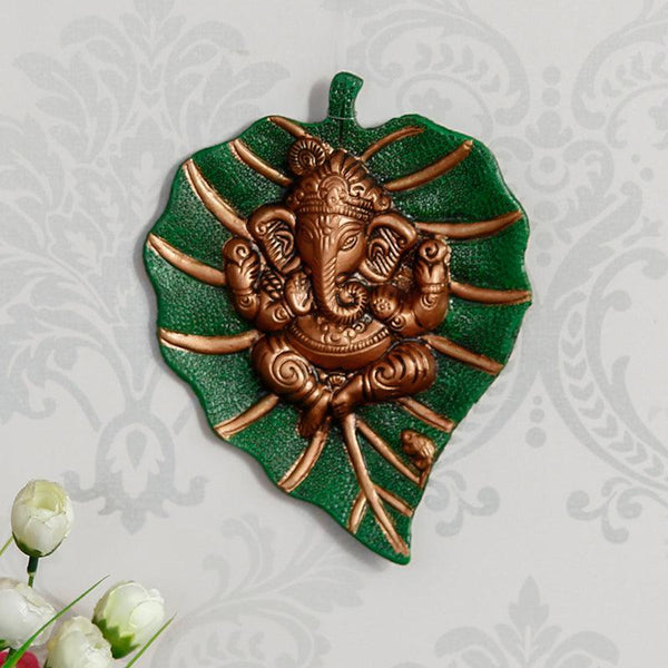 Buy Ganesha On Green Leaf Religious Wall Accent Wall Accents from Vaaree