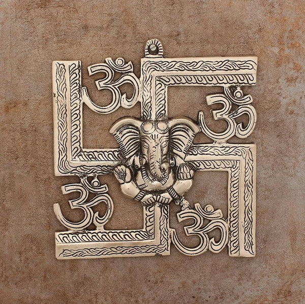 Buy Swastika Om Metal Religious Wall Accent - Silver Wall Accents from Vaaree