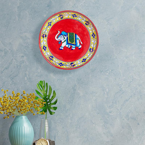 Buy Gajendra Ceramic Decorative Wall Plate - Red Wall Plate from Vaaree