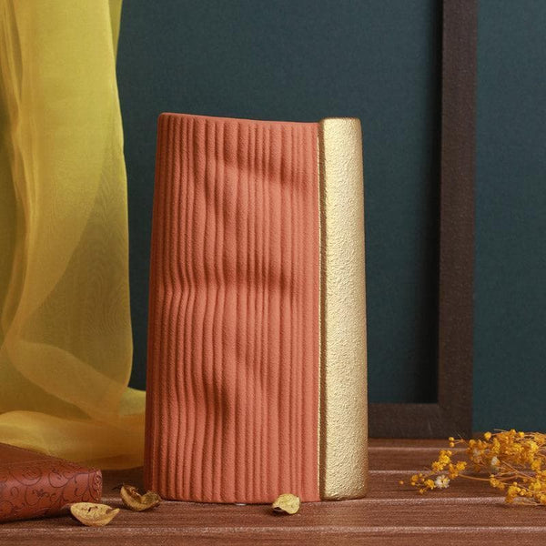 Buy Delphine Textured Vase - Rust Vase from Vaaree