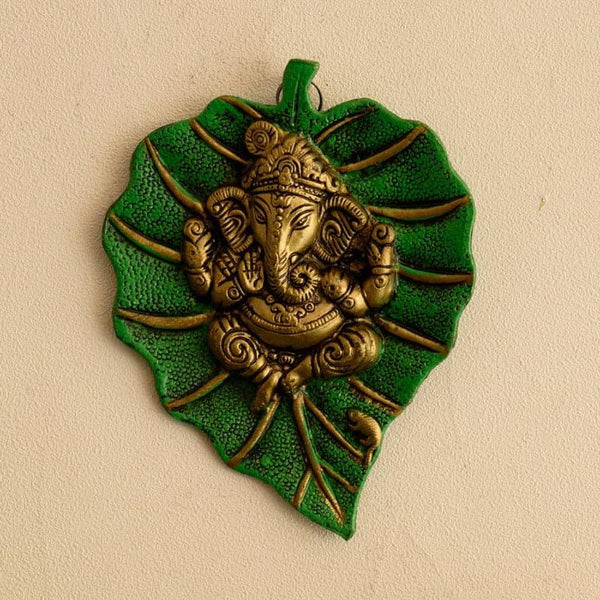 Buy Lord Ganesha On Green Leaf Wall Accent Wall Accents from Vaaree