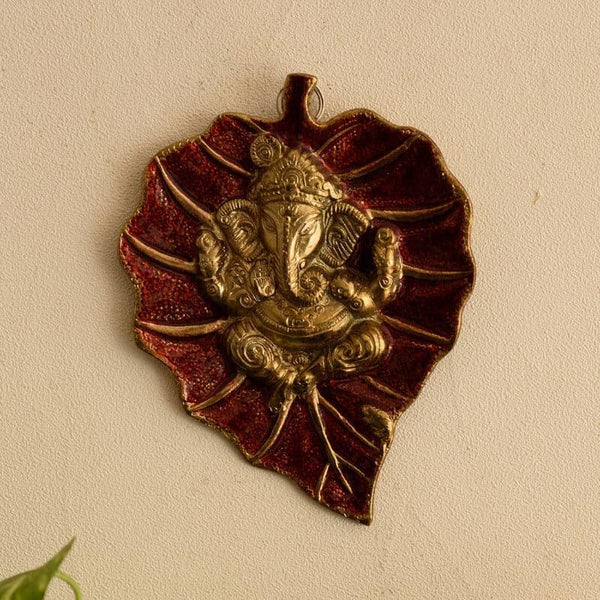 Buy Lord Ganesha On Red Leaf Idol Wall Accent Wall Accents from Vaaree