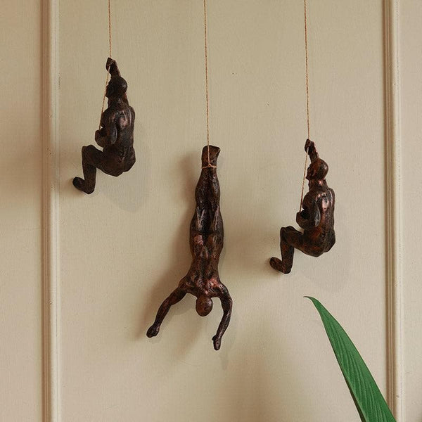 Buy The Alpinist Showpiece (Bronze) - Set Of Three Wall Accents from Vaaree