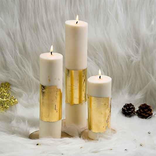 Buy Set of 3 White Gold Pillar Candles - Cinnamon Roll Scented Candles from Vaaree